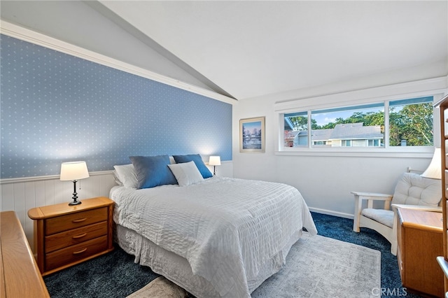 56 Ashbrook, Irvine, CA 92604 - bedroom with lofted ceiling, dark carpet, and wainscoting