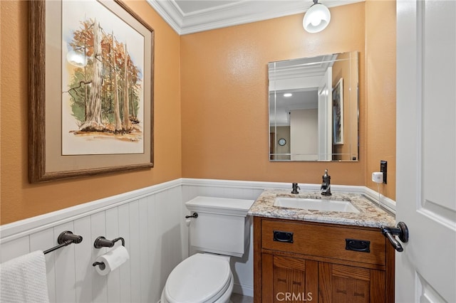56 Ashbrook, Irvine, CA 92604 - bathroom with crown molding, a wainscoted wall, vanity, and a decorative wall