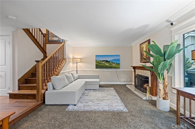 56 Ashbrook, Irvine, CA 92604 - living room featuring stairway, carpet, a high end fireplace, and ornamental molding