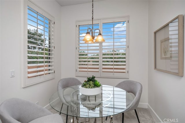 1501 Reggio Aisle, Irvine, CA 92606 - dining area with healthy amount of natural light, carpet, and a chandelier