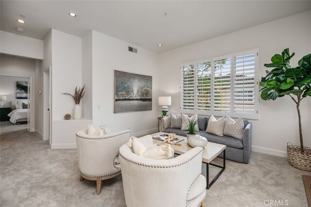 1501 Reggio Aisle, Irvine, CA 92606 - living room with light colored carpet and recessed lighting