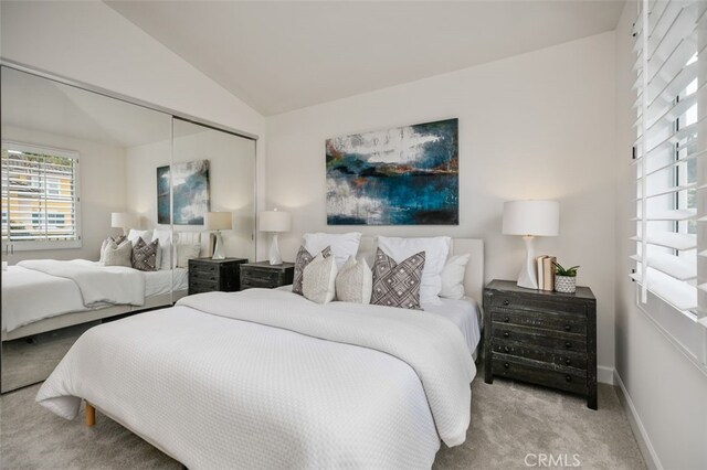 1501 Reggio Aisle, Irvine, CA 92606 - carpeted bedroom featuring a closet and vaulted ceiling