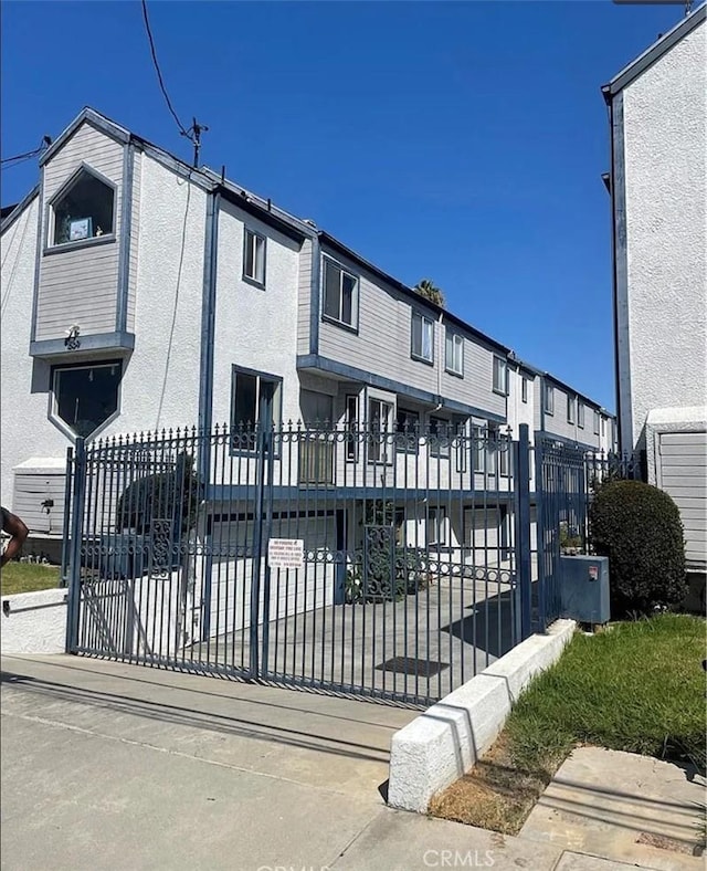 1509 W 146th St Unit 5, Gardena, CA 90247 - view of front of property with stucco siding