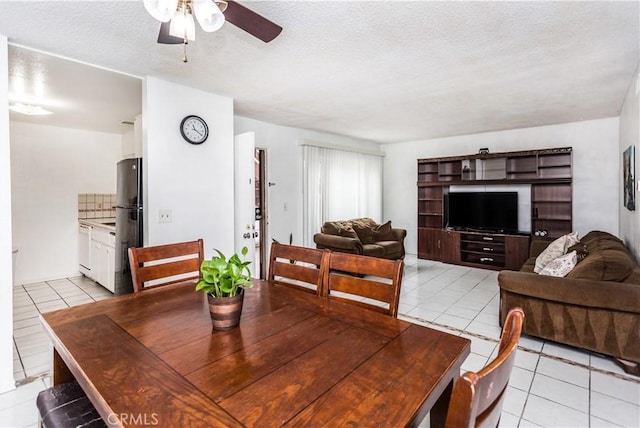 967 S Citron St Unit 3, Anaheim, CA 92805 - dining area with light tile patterned floors, ceiling fan, and a textured ceiling
