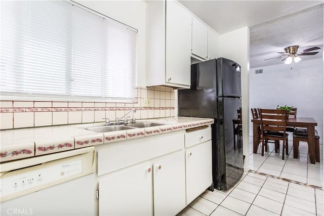 967 S Citron St Unit 3, Anaheim, CA 92805 - kitchen featuring white dishwasher, light countertops, ceiling fan, freestanding refrigerator, and backsplash