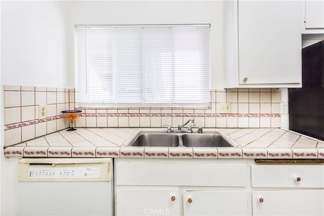 967 S Citron St Unit 3, Anaheim, CA 92805 - kitchen featuring white dishwasher, tile countertops, white cabinets, and backsplash