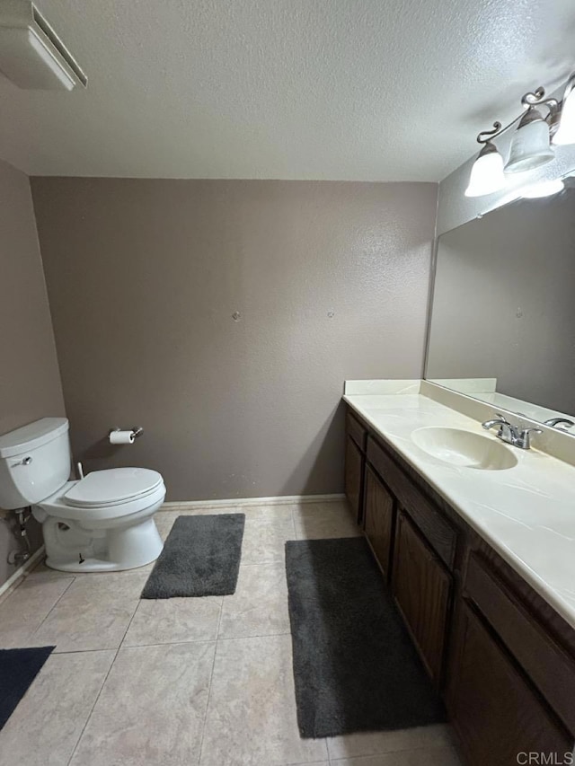 440 Citracado Pkwy Unit 30, Escondido, CA 92025 - bathroom featuring vanity, a textured ceiling, and tile patterned floors