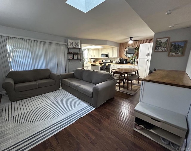 440 Citracado Pkwy Unit 30, Escondido, CA 92025 - living area with dark wood-style floors and a skylight
