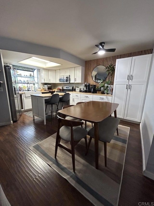 440 Citracado Pkwy Unit 30, Escondido, CA 92025 - dining area with dark wood-style floors and ceiling fan