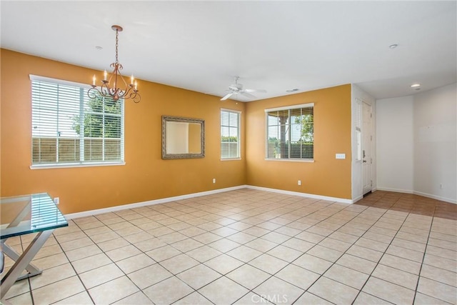 1802 Pummelo Dr, Redlands, CA 92374 - spare room featuring a chandelier, a ceiling fan, and light tile patterned floors