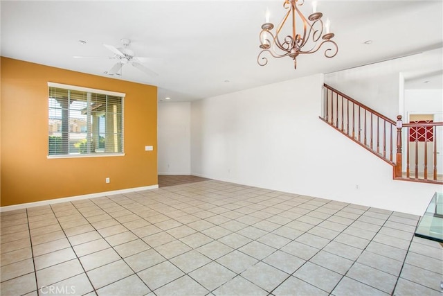 1802 Pummelo Dr, Redlands, CA 92374 - unfurnished living room with a chandelier, stairway, and ceiling fan