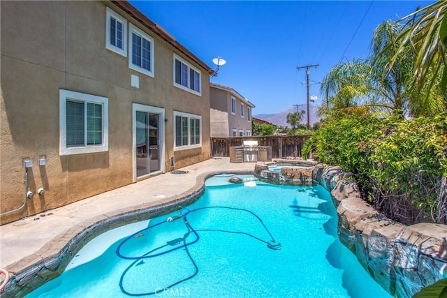 1802 Pummelo Dr, Redlands, CA 92374 - view of swimming pool with a patio area, a pool with connected hot tub, and area for grilling