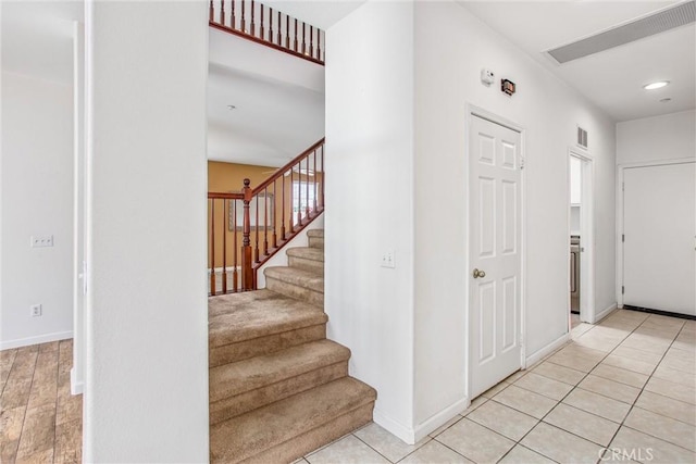 1802 Pummelo Dr, Redlands, CA 92374 - stairway with baseboards and tile patterned floors