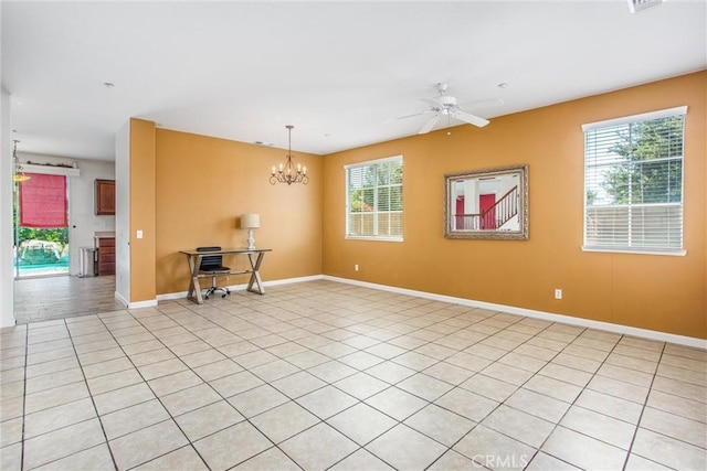 1802 Pummelo Dr, Redlands, CA 92374 - empty room with a ceiling fan, a chandelier, and light tile patterned floors