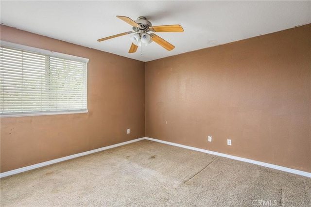 1802 Pummelo Dr, Redlands, CA 92374 - carpeted empty room with a ceiling fan and baseboards