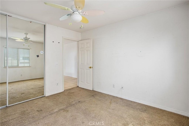 1802 Pummelo Dr, Redlands, CA 92374 - unfurnished bedroom with carpet flooring, a closet, and a ceiling fan