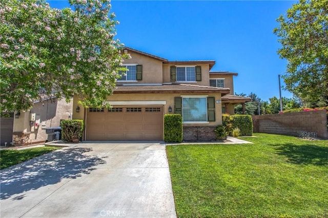 1802 Pummelo Dr, Redlands, CA 92374 - view of front of property with stucco siding, an attached garage, and driveway