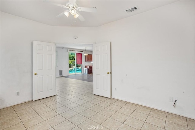 1802 Pummelo Dr, Redlands, CA 92374 - empty room featuring a ceiling fan and light tile patterned floors