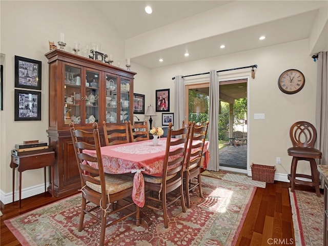 13815 Lexicon Ave, Sylmar, CA 91342 - dining room with dark wood-style floors, recessed lighting, and lofted ceiling