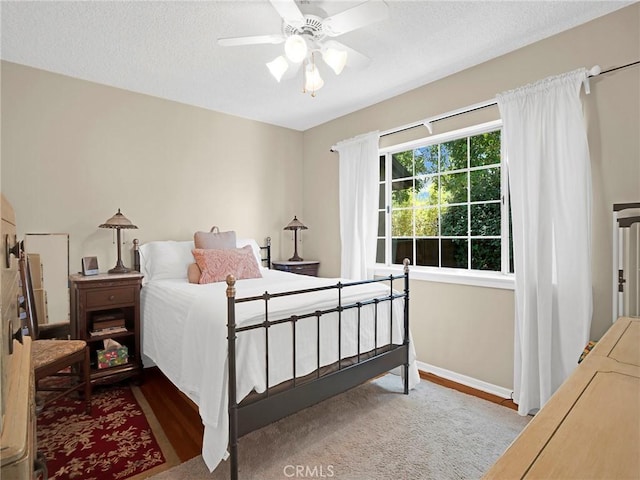 13815 Lexicon Ave, Sylmar, CA 91342 - bedroom with wood finished floors, a textured ceiling, and ceiling fan