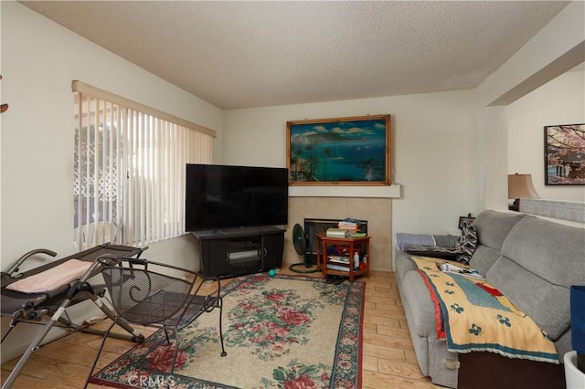 2508 Starbrite Ave, Rosamond, CA 93560 - living area with a textured ceiling and wood finished floors