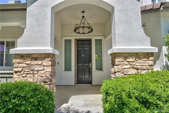 45118 Riverstone Ct, Temecula, CA 92592 - doorway to property with stone siding and stucco siding