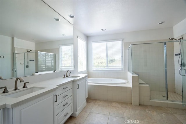 45118 Riverstone Ct, Temecula, CA 92592 - bathroom with a bath, double vanity, a shower stall, tile patterned flooring, and recessed lighting