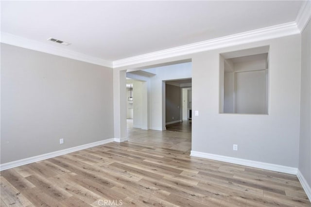 45118 Riverstone Ct, Temecula, CA 92592 - empty room featuring ornamental molding and light wood-style flooring