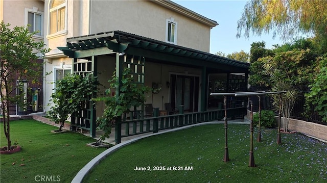 19910 Tennessee Trl, Walnut, CA 91789 - rear view of house with stucco siding and a yard
