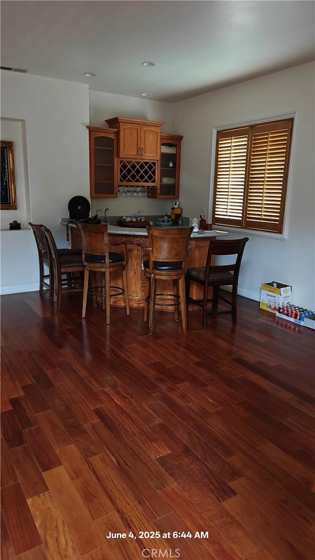 19910 Tennessee Trl, Walnut, CA 91789 - dining space with bar with sink and wood finished floors