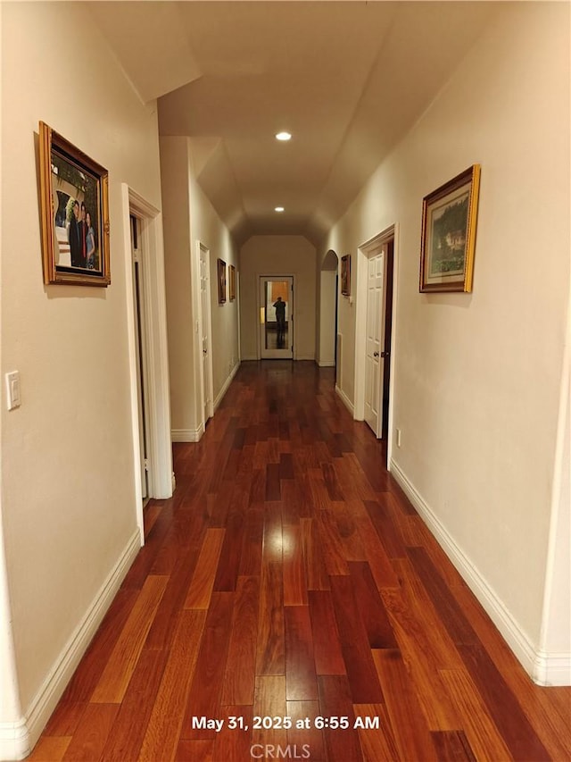 19910 Tennessee Trl, Walnut, CA 91789 - hall featuring arched walkways, dark wood-style flooring, vaulted ceiling, and recessed lighting