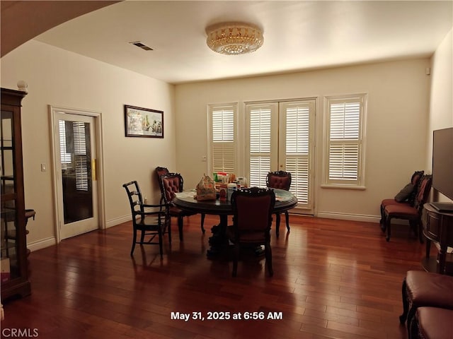 19910 Tennessee Trl, Walnut, CA 91789 - dining space featuring wood-type flooring and arched walkways