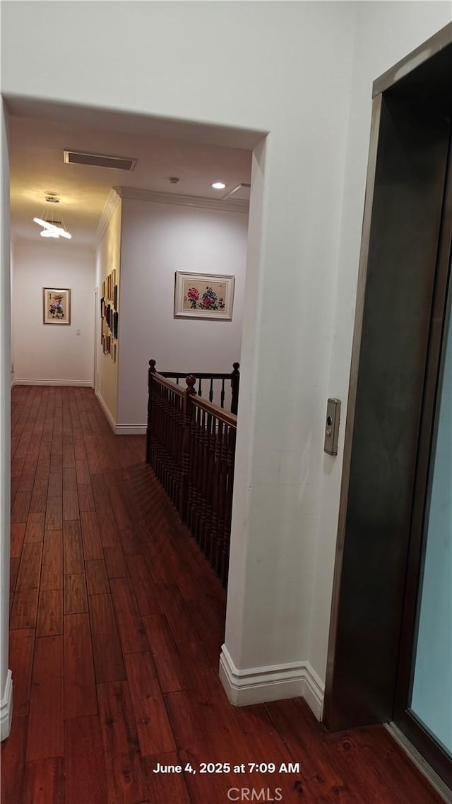19910 Tennessee Trl, Walnut, CA 91789 - corridor with elevator, wood finished floors, and crown molding