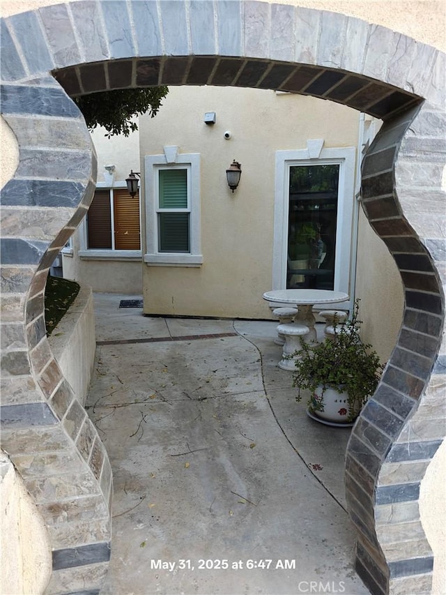 19910 Tennessee Trl, Walnut, CA 91789 - doorway to property with stucco siding and a patio