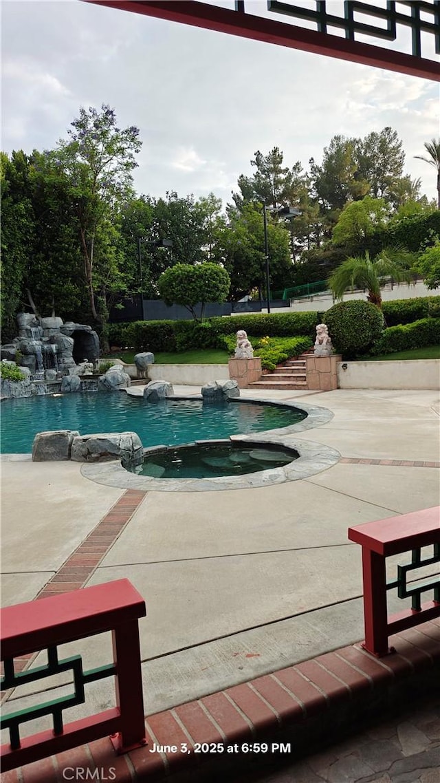 19910 Tennessee Trl, Walnut, CA 91789 - view of swimming pool with a pool with connected hot tub and a patio