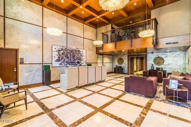 1205 Pacific Hwy Unit 1005, San Diego, CA 92101 - reception area featuring a towering ceiling, a wood ceiling with exposed beams, a chandelier, coffered ceiling, and recessed lighting