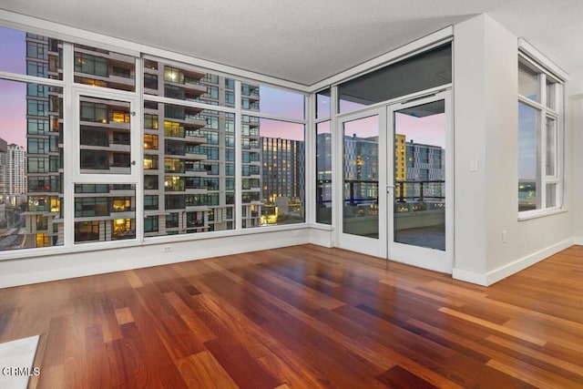 1205 Pacific Hwy Unit 1005, San Diego, CA 92101 - empty room featuring a view of city and wood finished floors