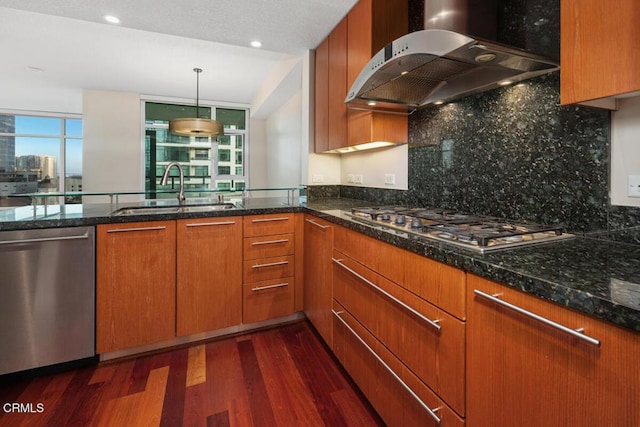 1205 Pacific Hwy Unit 1005, San Diego, CA 92101 - kitchen with island range hood, appliances with stainless steel finishes, dark wood-type flooring, and dark stone countertops