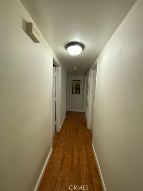 18735 Knapp St, Northridge, CA 91324 - hallway featuring wood finished floors and baseboards