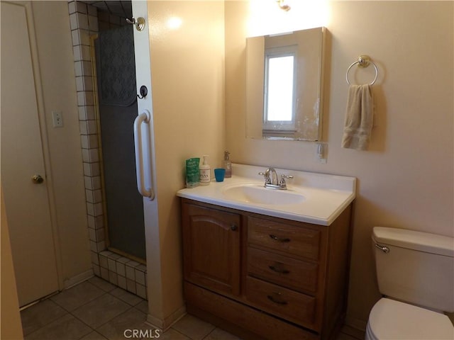 18735 Knapp St, Northridge, CA 91324 - bathroom featuring vanity, tile patterned flooring, and a shower with shower door