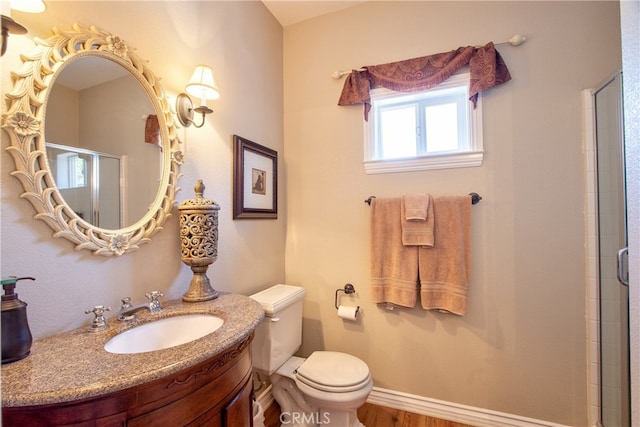 42768 El Calamar Rd, Temecula, CA 92590 - bathroom featuring vanity, an enclosed shower, and wood finished floors