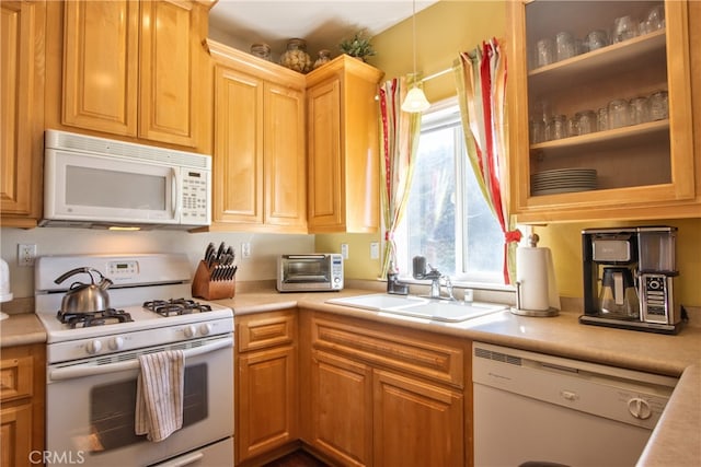 42768 El Calamar Rd, Temecula, CA 92590 - kitchen featuring white appliances, plenty of natural light, and light countertops