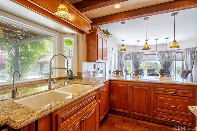 42768 El Calamar Rd, Temecula, CA 92590 - kitchen featuring dark wood-style floors, decorative light fixtures, light stone counters, beam ceiling, and healthy amount of natural light