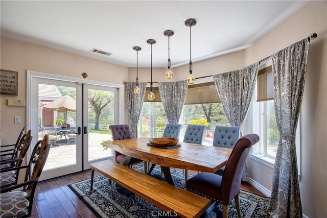 42768 El Calamar Rd, Temecula, CA 92590 - dining area with dark wood-style flooring and french doors