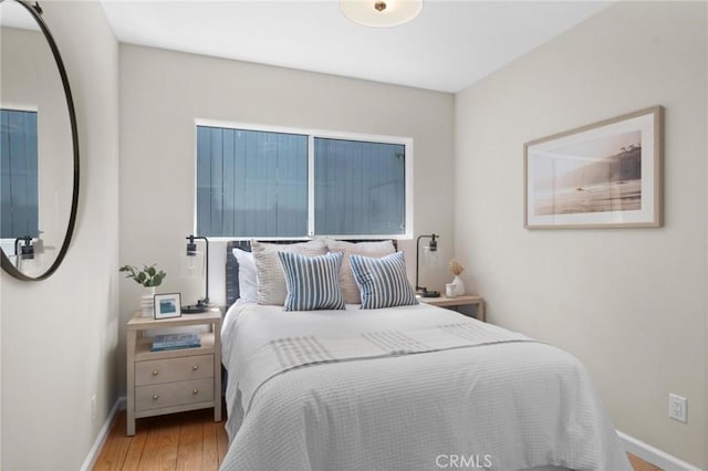 1715 Stanford Ave, Redondo Beach, CA 90278 - bedroom featuring baseboards and wood finished floors