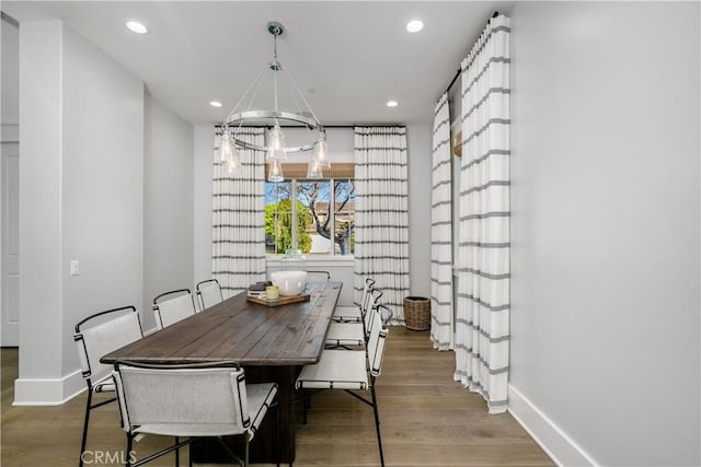 11385 Baskerville Rd, Rossmoor, CA 90720 - dining area featuring recessed lighting, wood finished floors, a chandelier, and a barn door