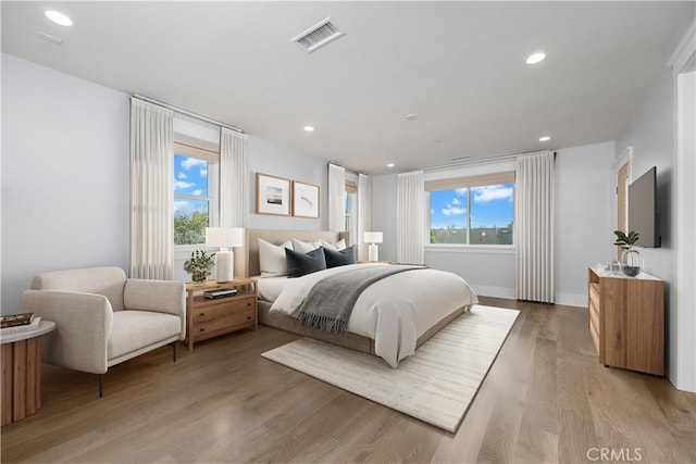 11385 Baskerville Rd, Rossmoor, CA 90720 - bedroom with light wood-type flooring and recessed lighting