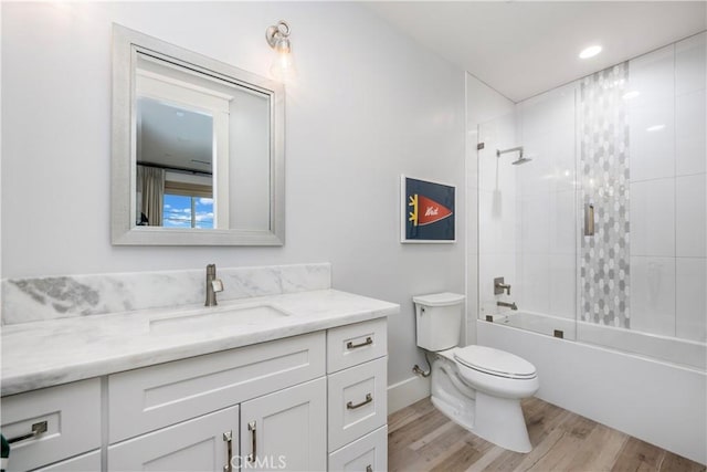 11385 Baskerville Rd, Rossmoor, CA 90720 - full bath with vanity, wood finished floors, and tub / shower combination