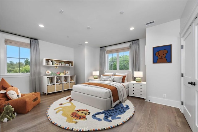 11385 Baskerville Rd, Rossmoor, CA 90720 - bedroom featuring wood finished floors and recessed lighting
