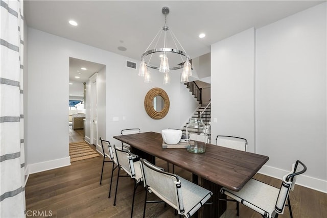 11385 Baskerville Rd, Rossmoor, CA 90720 - dining area featuring a chandelier, stairway, dark wood-style floors, and recessed lighting